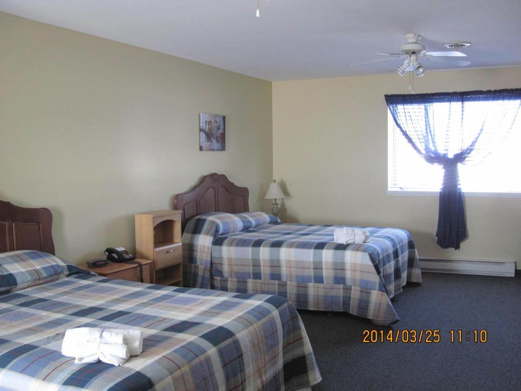 Motel Parc Beaumont Inc. Quarto foto